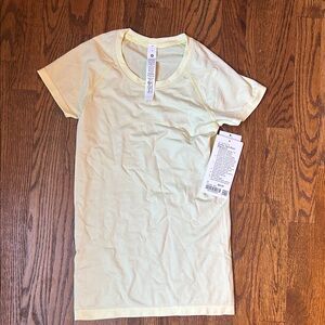 lululemon athletica Yellow Short Sleeve Tee. Never worn with tags!